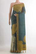 Bottle Green Tussar Saree with Embroidered on the body and Zari Border.  displayed on a mannequin