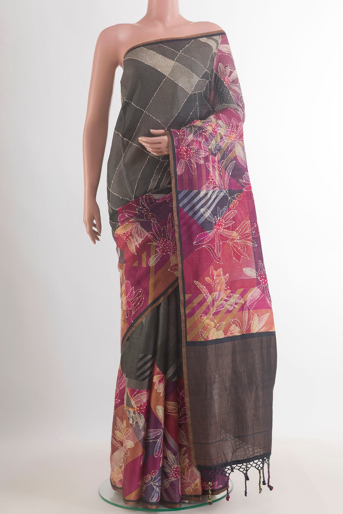Multi Color Tussar Saree with Printed design on the body and Embroidered Border.  displayed on a mannequin