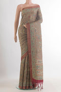 Beige Tussar Saree with Embroidered on the body and Embroidered Border.  displayed on a mannequin