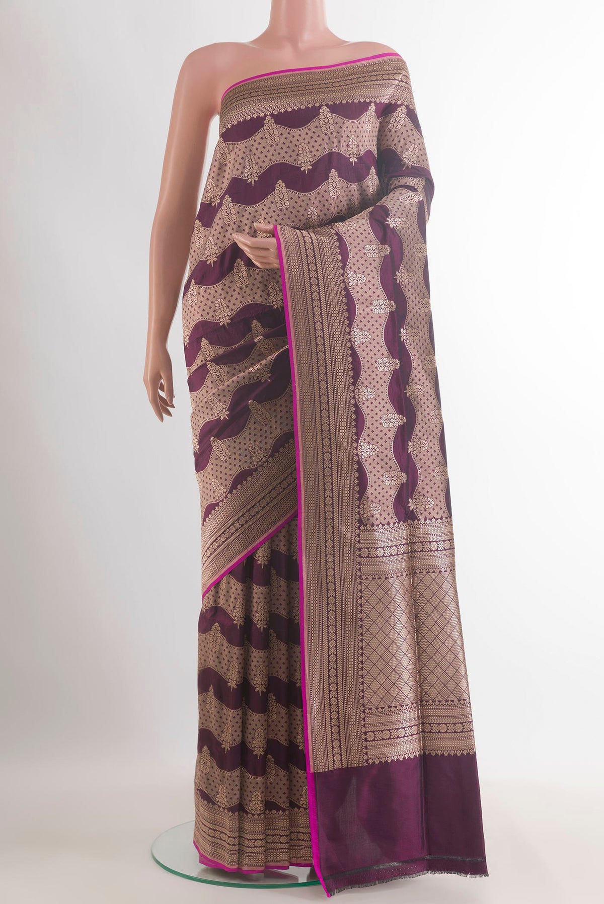 Pure Silk Burgundy Banarasi Saree with Zari Brocade on the body and Zari Border.  displayed on a mannequin