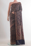 Pure Silk Navy Blue Banarasi Jamavar Saree with Jamdani on the body and Zari Border.  displayed on a mannequin