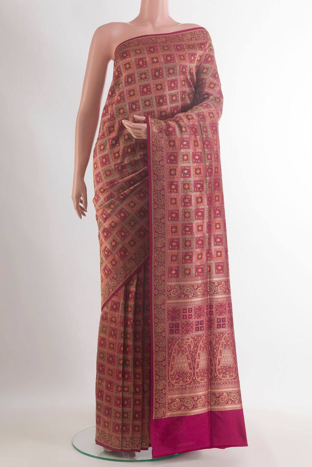 Pure Silk Maroon Dual Tone Banarasi Jamavar Saree with Jamdani on the body and Zari Border.  displayed on a mannequin