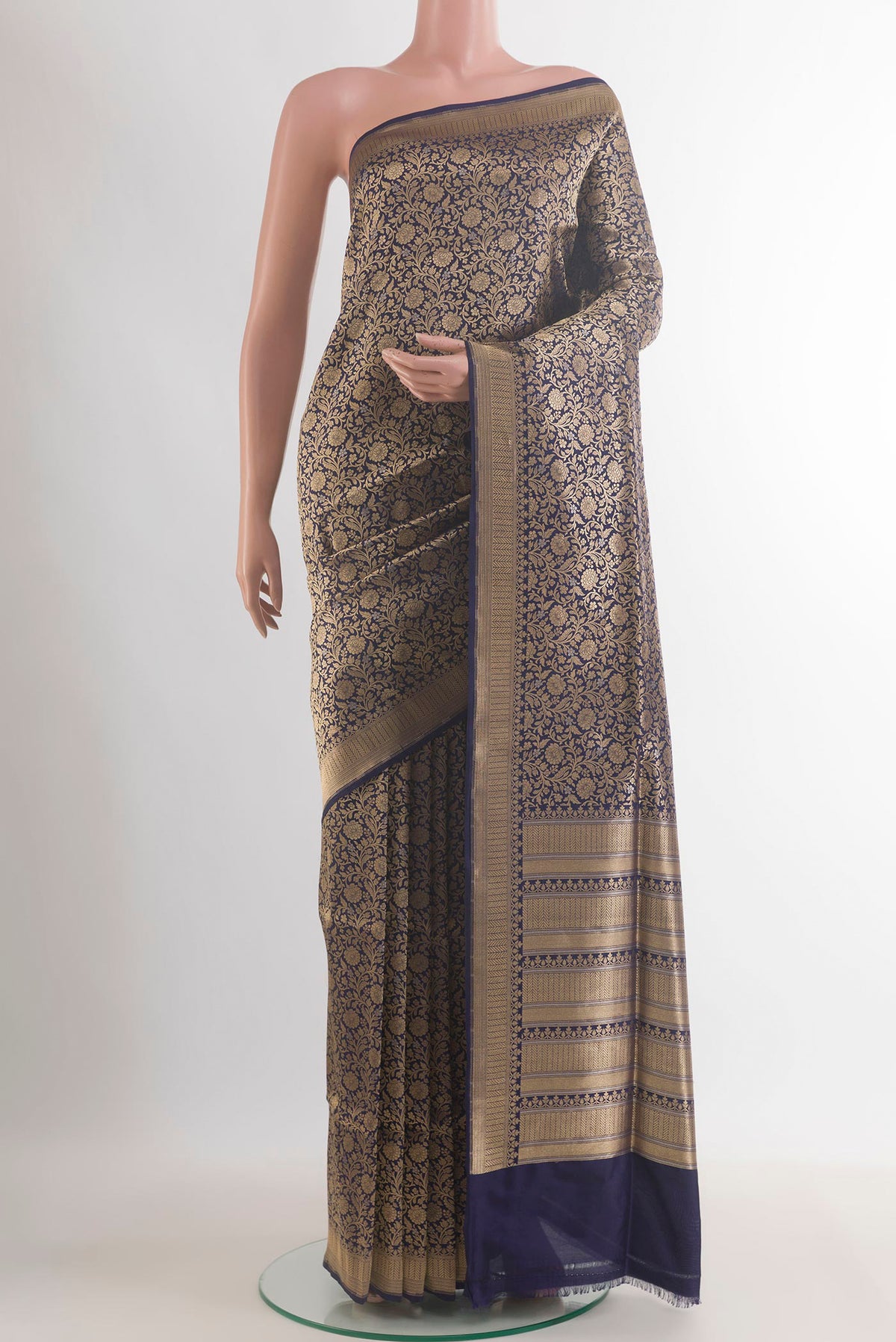 Pure Silk Navy Blue Banarasi Saree with Zari Brocade on the body and Zari Border.  displayed on a mannequin