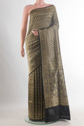 Pure Silk Black Banarasi Saree with Zari Brocade on the body and Zari Border.  displayed on a mannequin