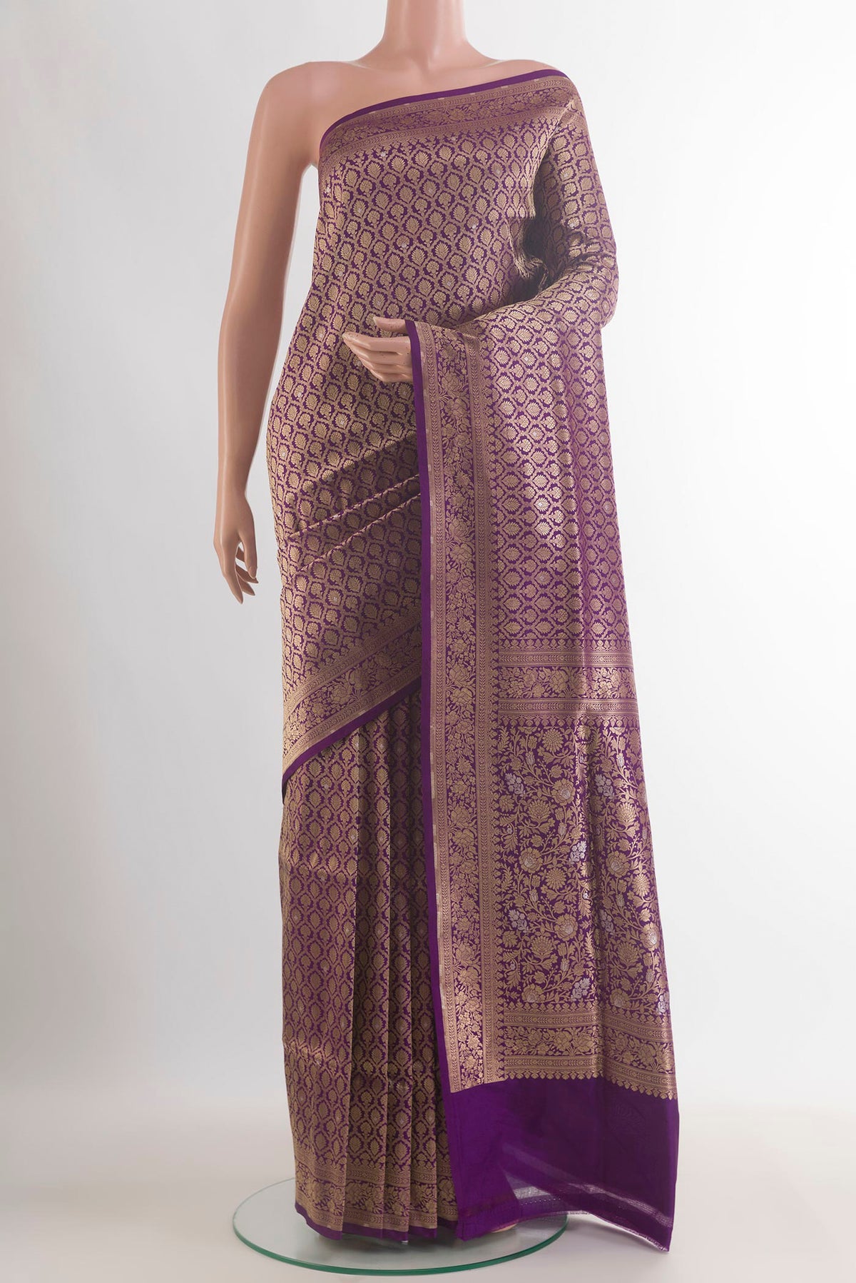 Pure Silk Purple Banarasi Saree with Zari Brocade on the body and Zari Border.  displayed on a mannequin