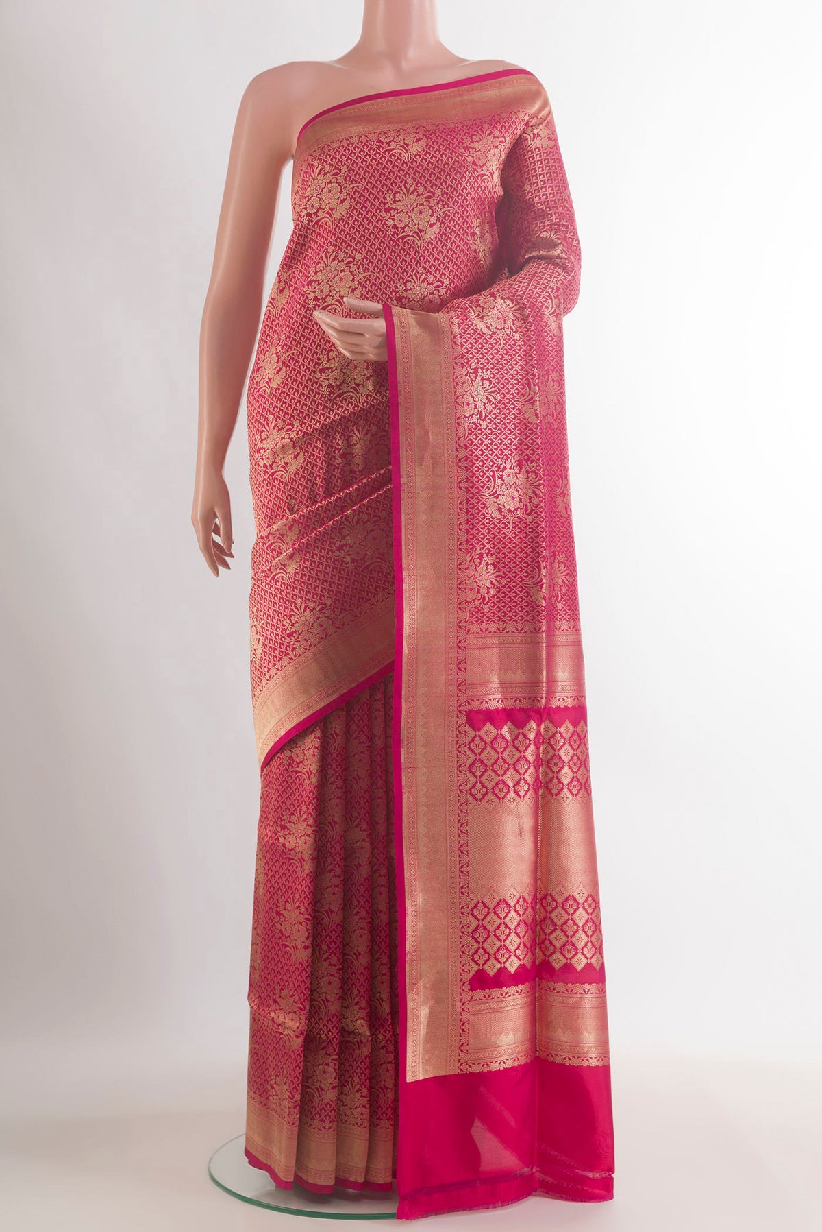 Pure Silk Pink Banarasi Saree with Zari Brocade on the body and Zari Border.  displayed on a mannequin