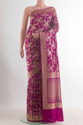 Pure Silk Magenta Banarasi Saree with Zari Brocade on the body and Zari Border.  displayed on a mannequin