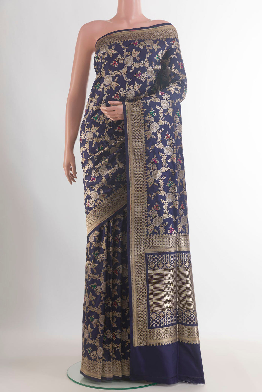 Pure Silk Navy Blue Banarasi Saree with Zari Brocade on the body and Zari Border.  displayed on a mannequin