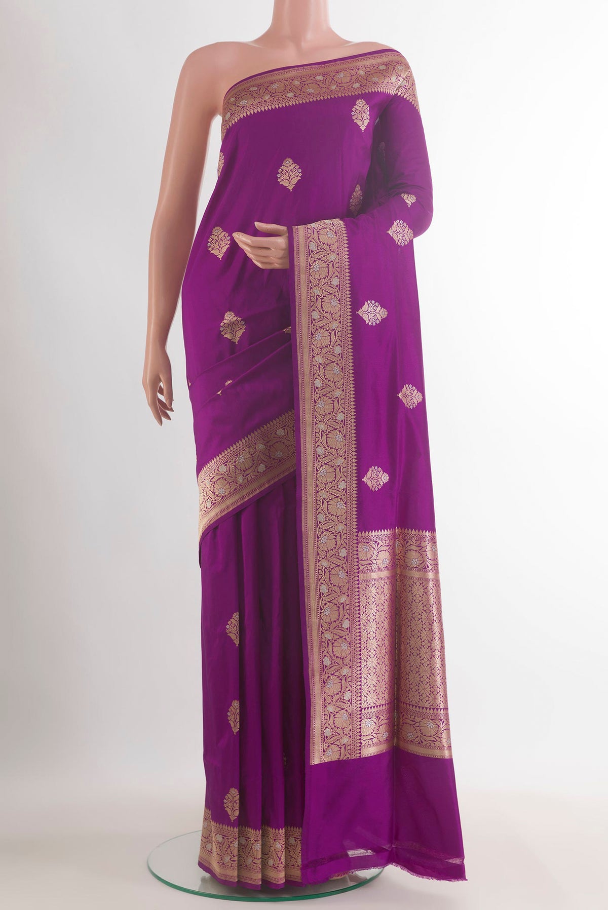 Pure Silk Purple Banarasi Saree with Zari Butta on the body and Zari Border.  displayed on a mannequin