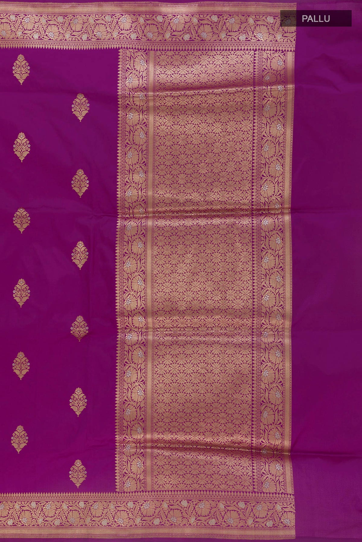 Close up image of the pallu of Pure Silk Purple Banarasi Saree with Zari Butta on the body and Zari Border. 