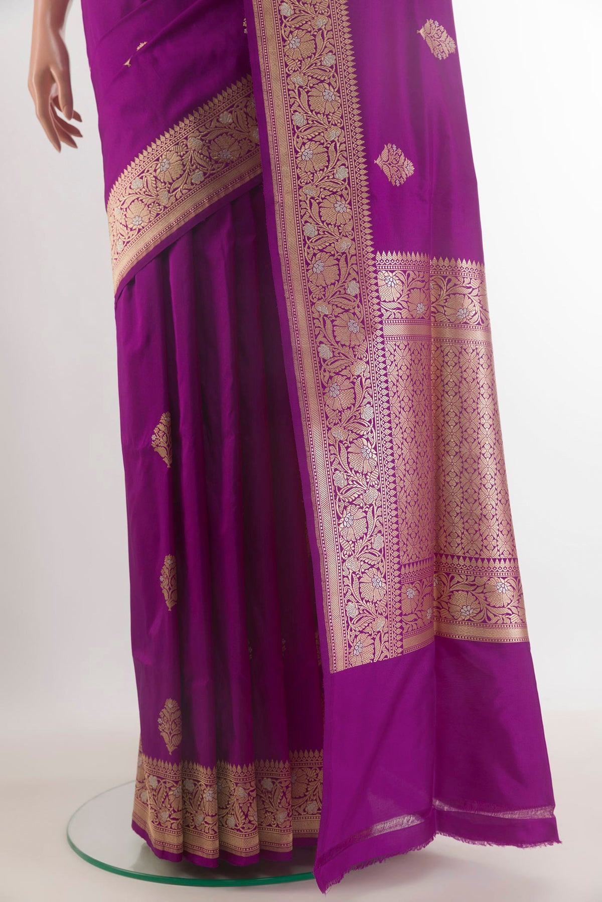 Pleats and pallu of Pure Silk Purple Banarasi Saree with Zari Butta on the body and Zari Border. 