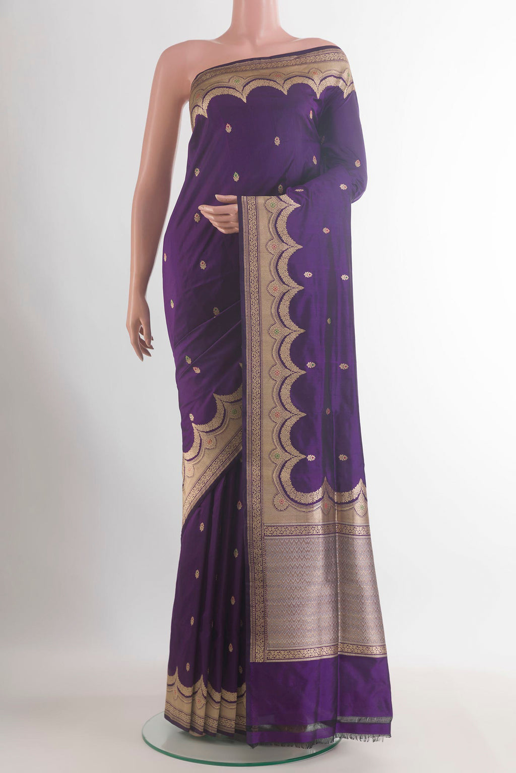 Pure Silk Violet Banarasi Saree with Zari Butta on the body and Zari Border.  displayed on a mannequin