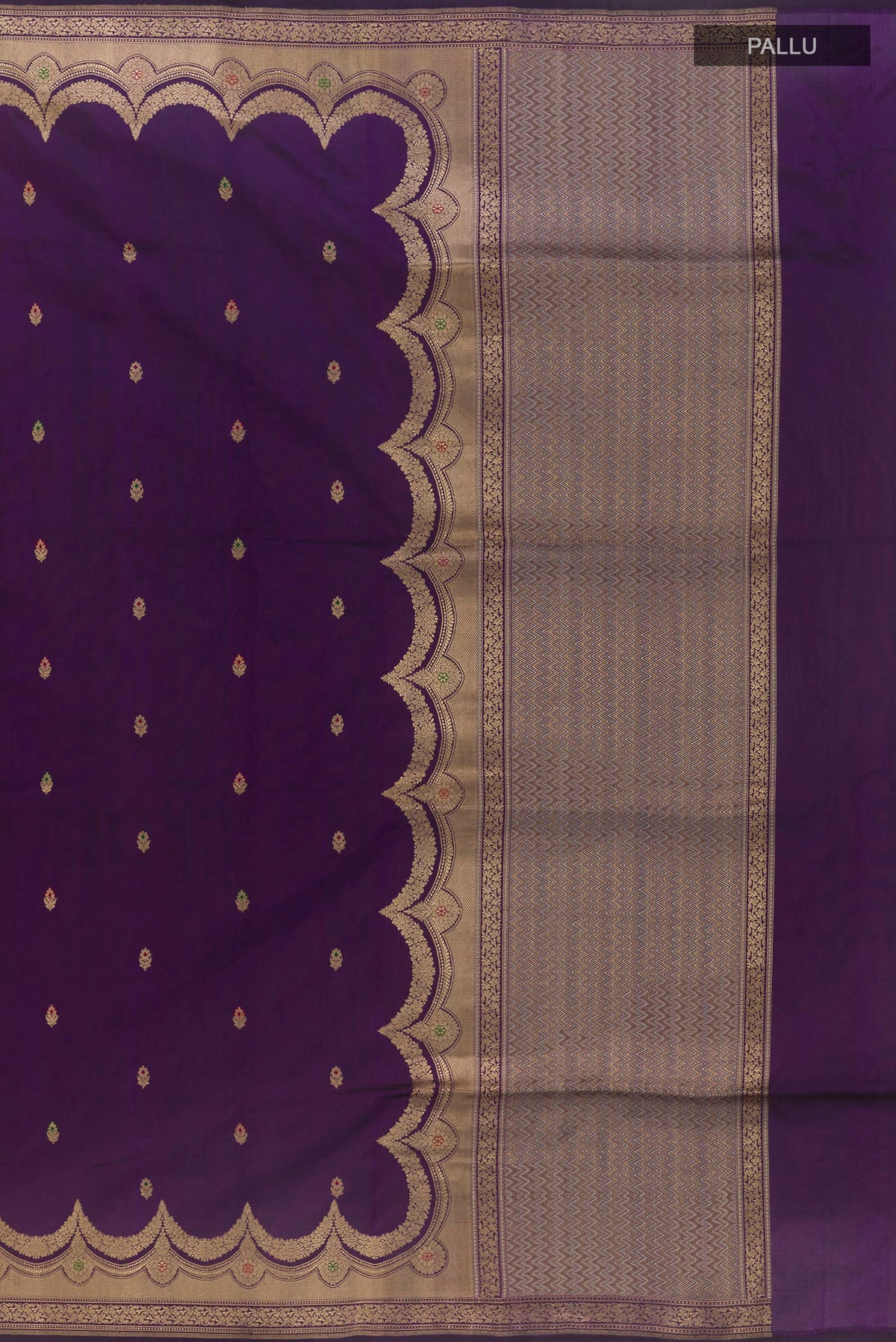 Close up image of the pallu of Pure Silk Violet Banarasi Saree with Zari Butta on the body and Zari Border. 