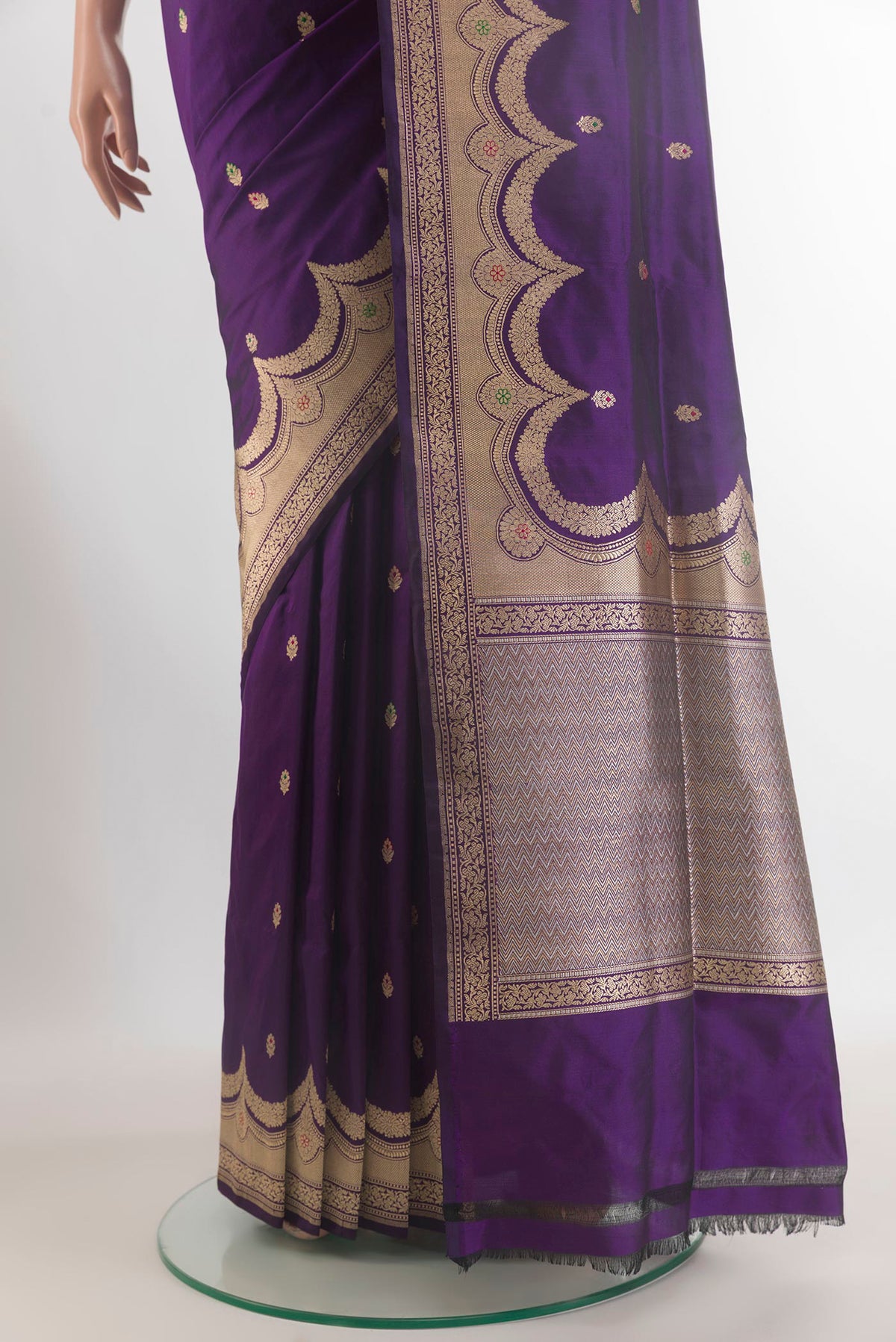 Pleats and pallu of Pure Silk Violet Banarasi Saree with Zari Butta on the body and Zari Border. 