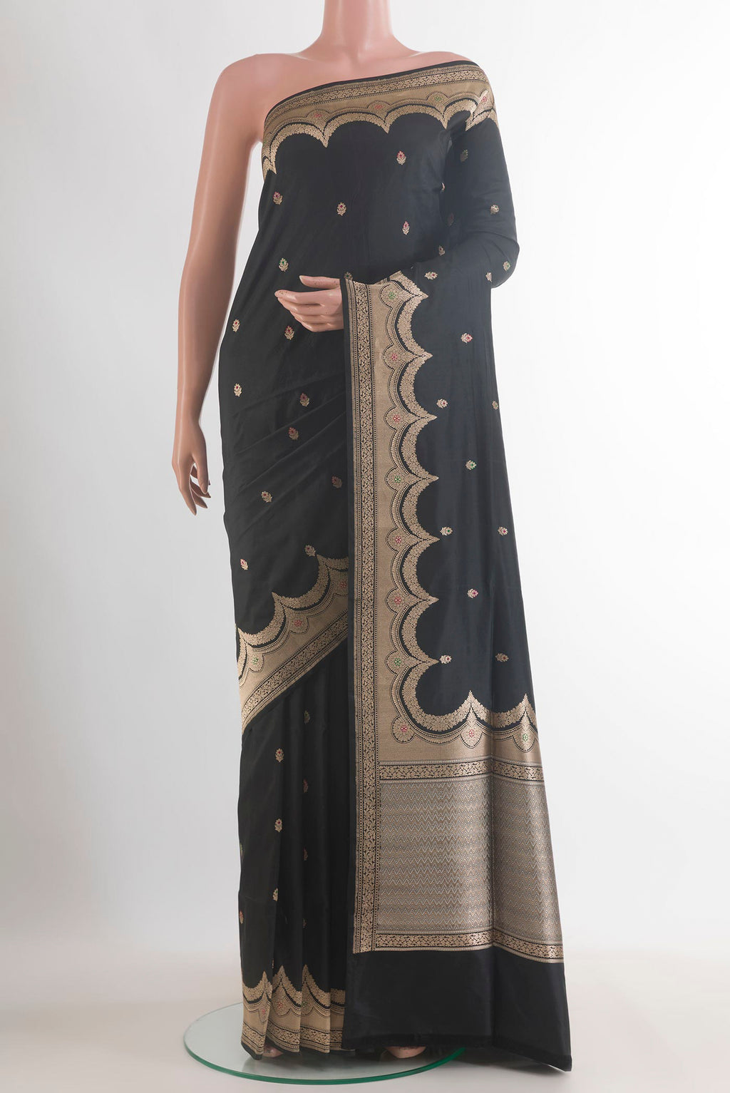 Pure Silk Black Banarasi Saree with Zari Butta on the body and Zari Border.  displayed on a mannequin