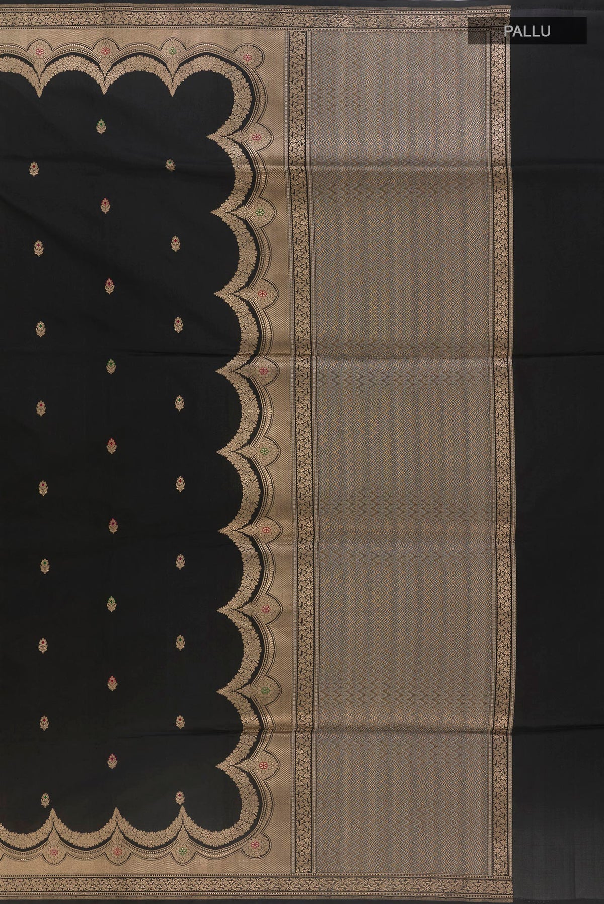 Close up image of the pallu of Pure Silk Black Banarasi Saree with Zari Butta on the body and Zari Border. 