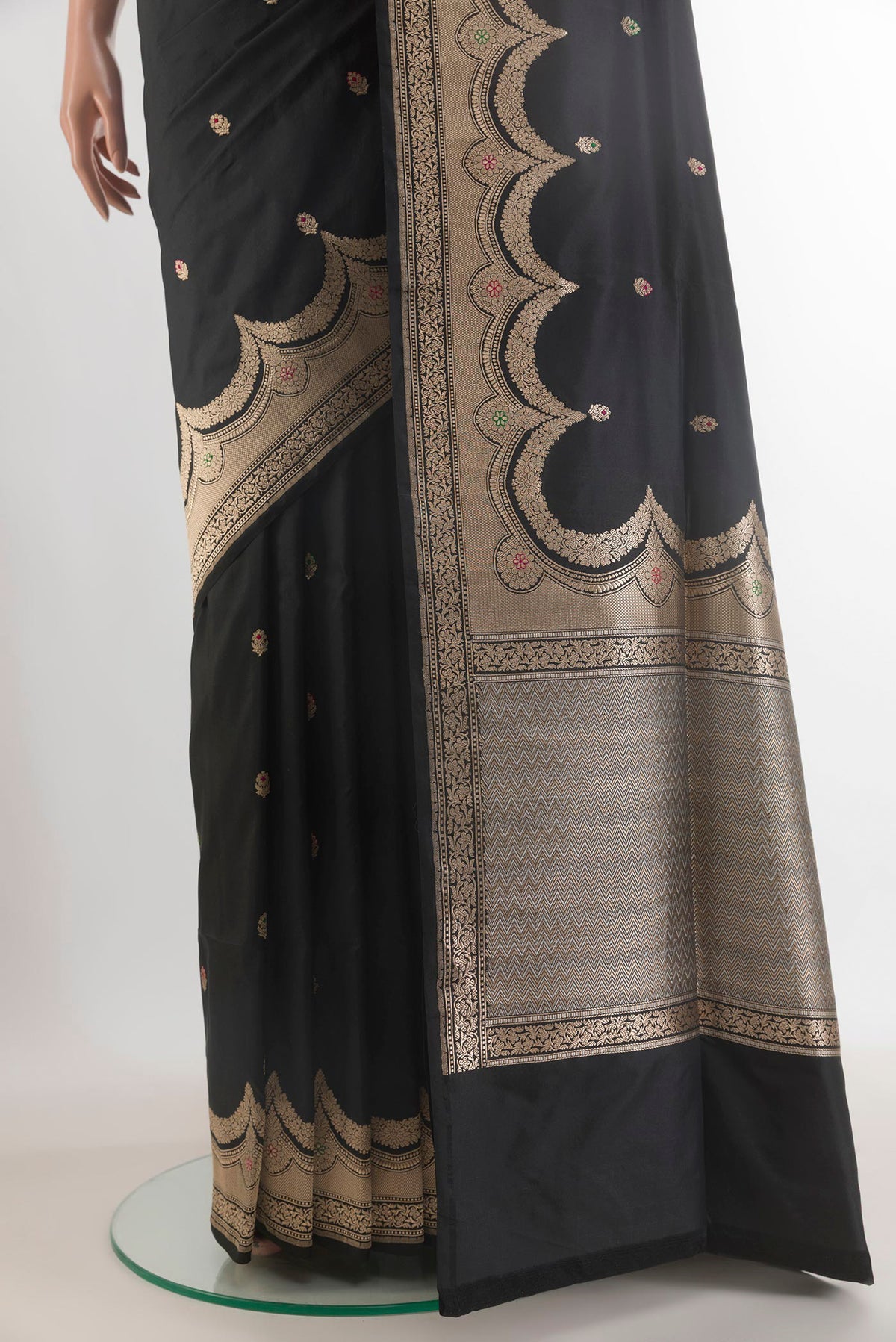 Pleats and pallu of Pure Silk Black Banarasi Saree with Zari Butta on the body and Zari Border. 