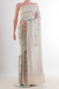 Off White Tussar Saree with Zari Brocade on the body and Zari Border.  displayed on a mannequin