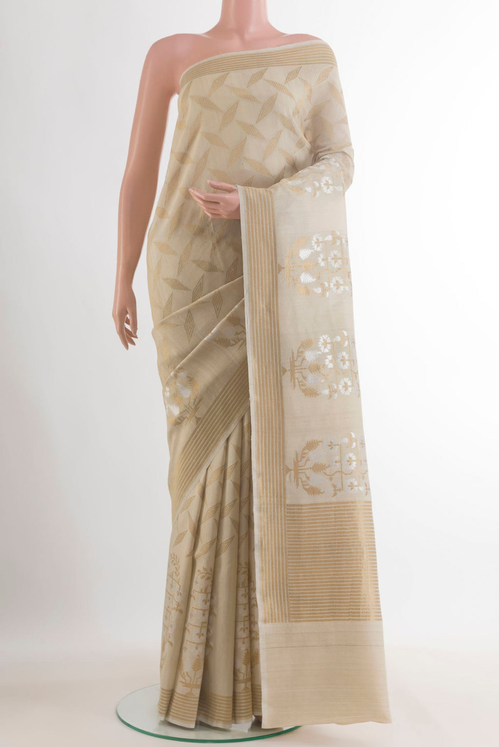 Beige Banarasi Tussar Saree with Zari Brocade on the body and Zari Border.  displayed on a mannequin