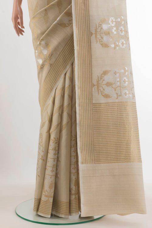 Pleats and pallu of Beige Banarasi Tussar Saree with Zari Brocade on the body and Zari Border. 