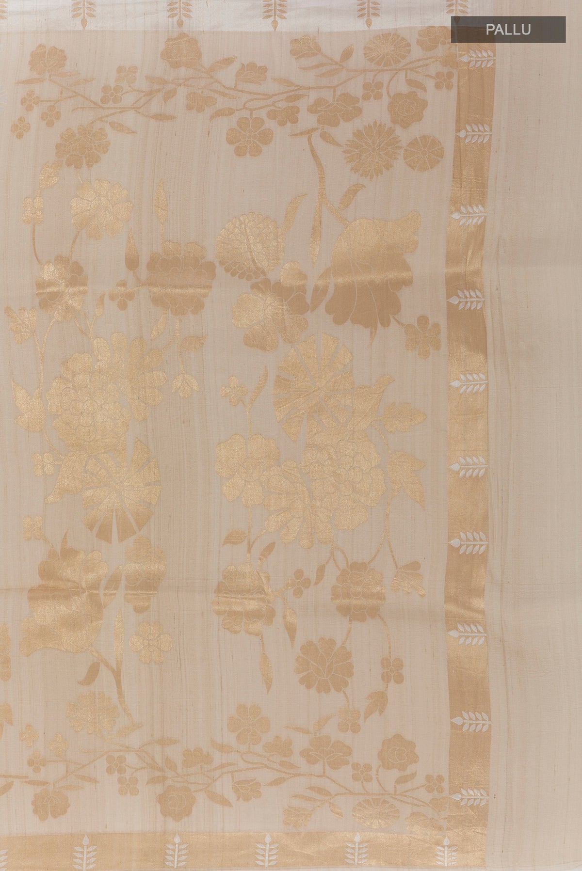 Close up image of the pallu of Off White Tussar Saree with Zari Butta on the body and Zari Border. 