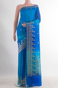 Pure Silk Royal Blue Banarasi Katan Saree with Zari Butta on the body and Zari Border.  displayed on a mannequin