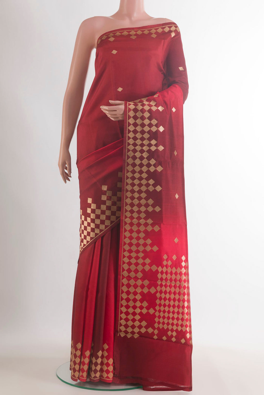 Pure Silk Maroon Banarasi Katan Saree with Zari Butta on the body and Zari Border.  displayed on a mannequin