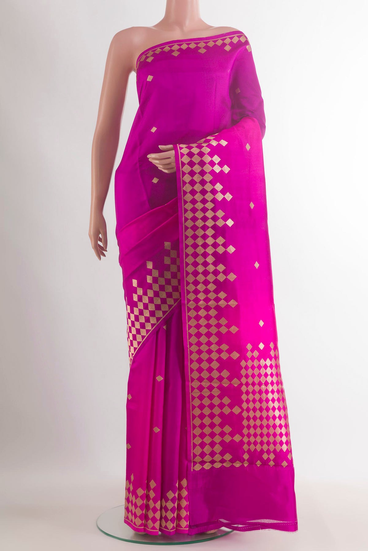Pure Silk Dark Pink Banarasi Katan Saree with Zari Butta on the body and Zari Border.  displayed on a mannequin