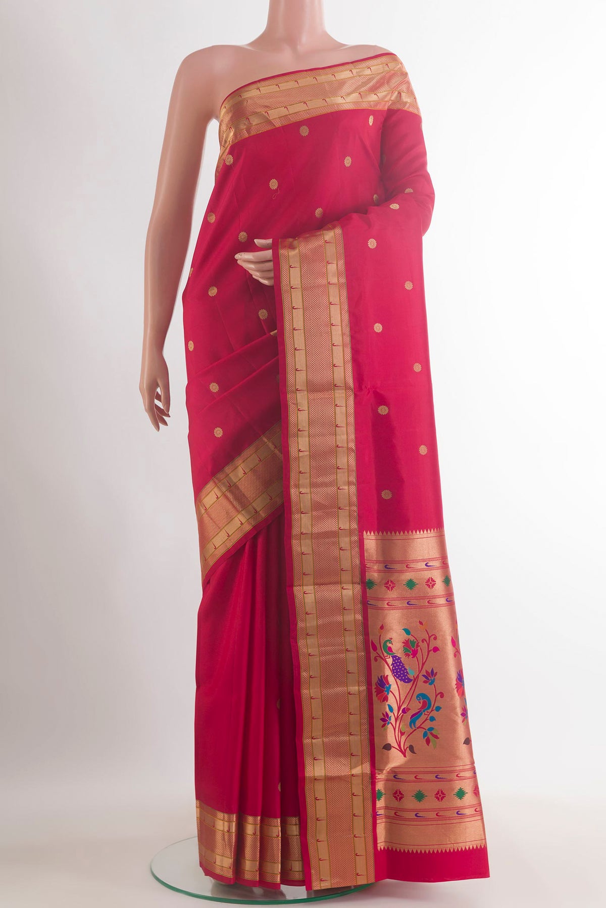 Pure Silk Red Soft Saree with Zari Butta on the body and Paithani Border.  displayed on a mannequin