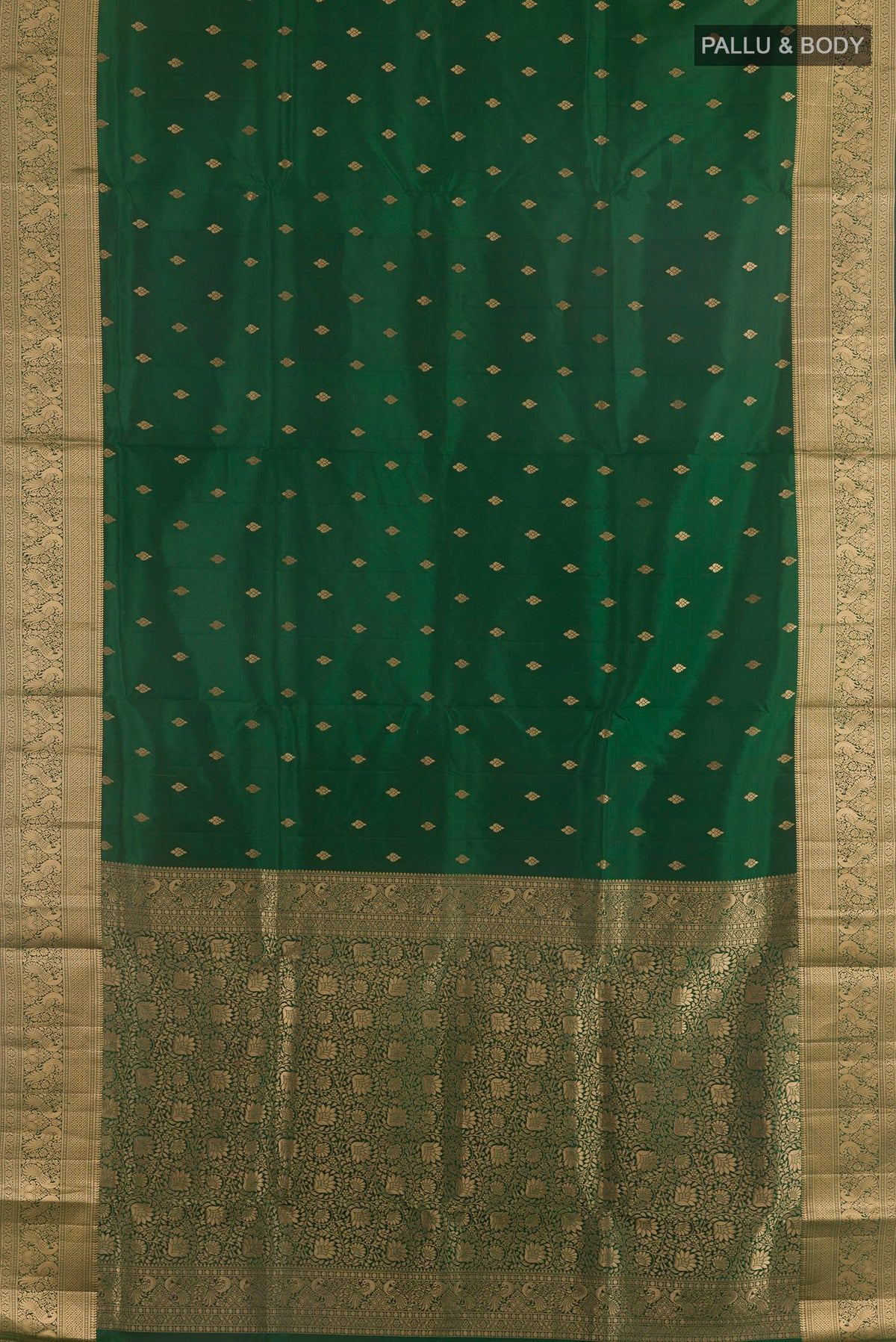 Flat view of Pure Silk Green Soft Saree with Zari Butta on the body and Zari Border. 
