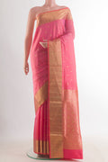 Pure Silk Pink Soft Saree with Zari Butta on the body and Zari Border.  displayed on a mannequin
