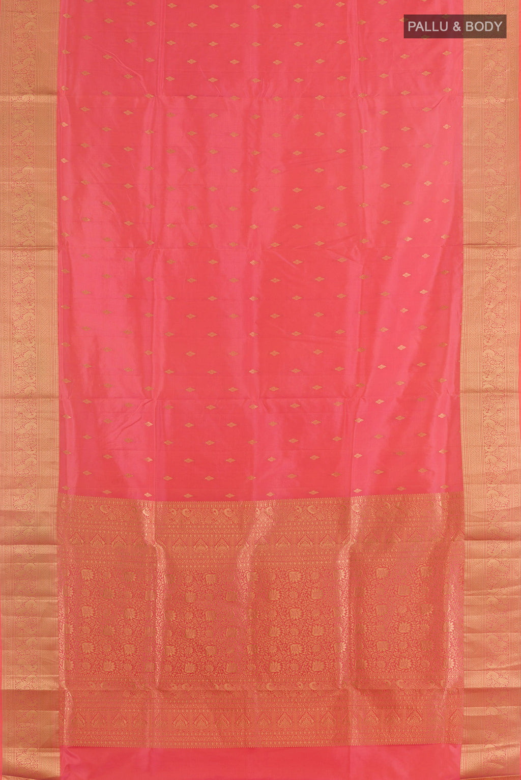 Flat view of Pure Silk Pink Soft Saree with Zari Butta on the body and Zari Border. 