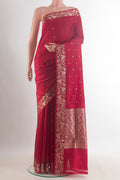 Pure Silk Red Banarasi Katan Saree with Zari Butta on the body and Zari Border.  displayed on a mannequin
