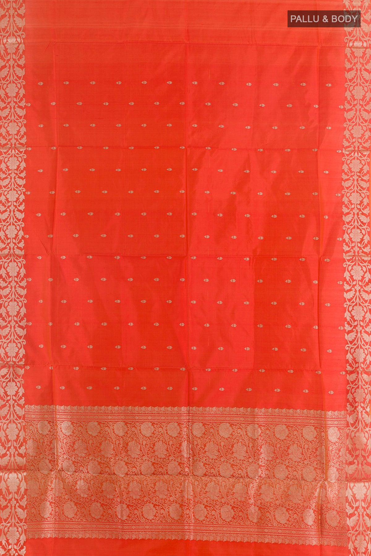 Flat view of Pure Silk Orange Banarasi Katan Saree with Zari Butta on the body and Zari Border. 