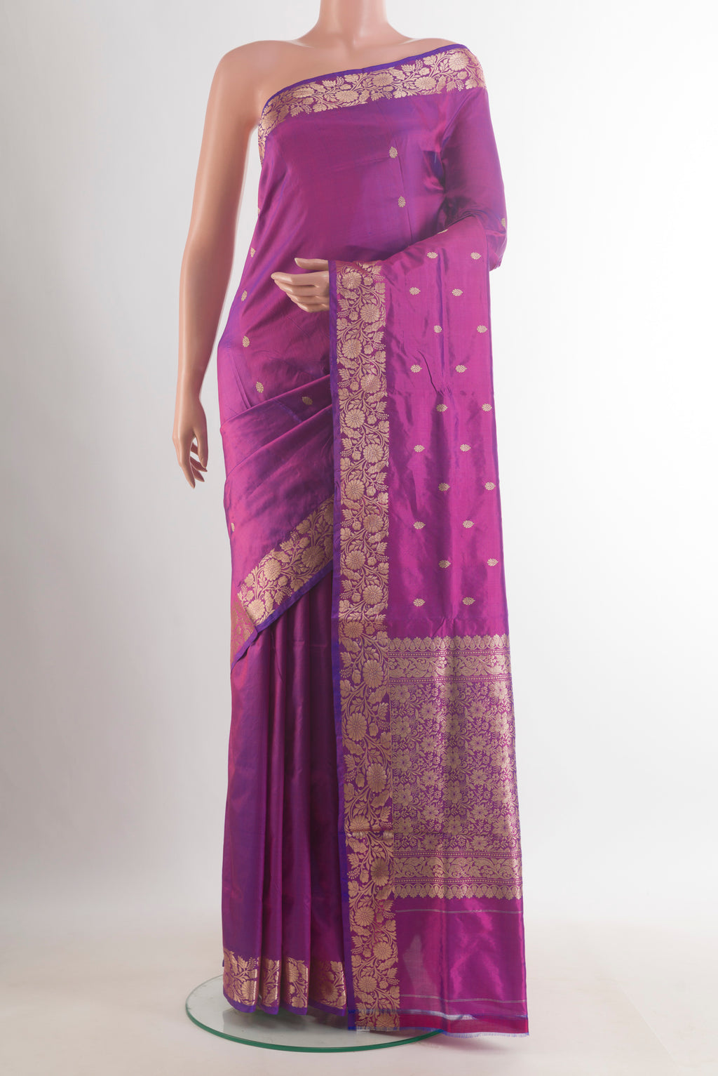 Pure Silk Purple Banarasi Katan Saree with Zari Butta on the body and Zari Border.  displayed on a mannequin