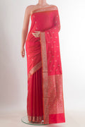 Pure Silk Red Banarasi Katan Saree with Zari Butta on the body and Zari Border.  displayed on a mannequin