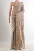 Pure Silk Grey Banarasi Katan Saree with Zari Butta on the body and Zari Border.  displayed on a mannequin