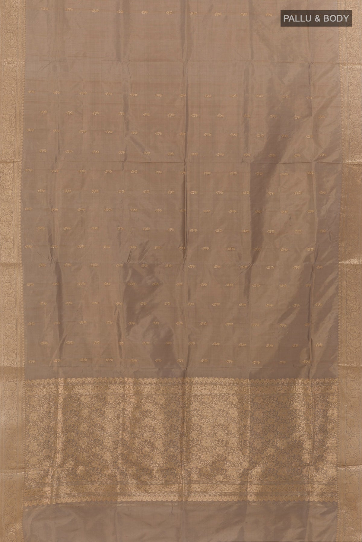 Flat view of Pure Silk Grey Banarasi Katan Saree with Zari Butta on the body and Zari Border. 