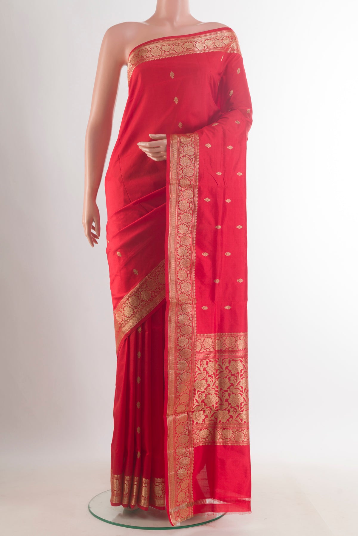 Pure Silk Red Banarasi Katan Saree with Zari Butta on the body and Zari Border.  displayed on a mannequin