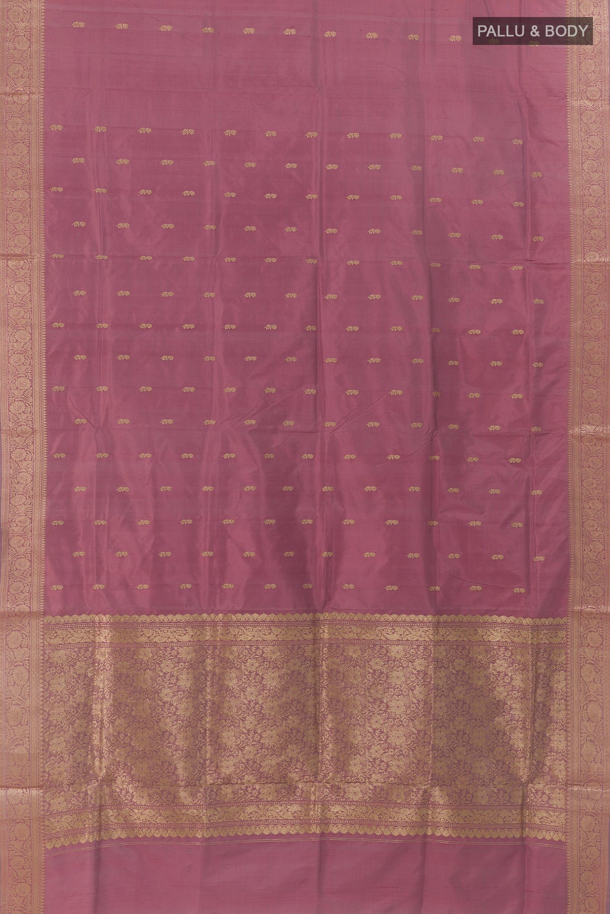 Flat view of Pure Silk Mauve Banarasi Katan Saree with Zari Butta on the body and Zari Border. 