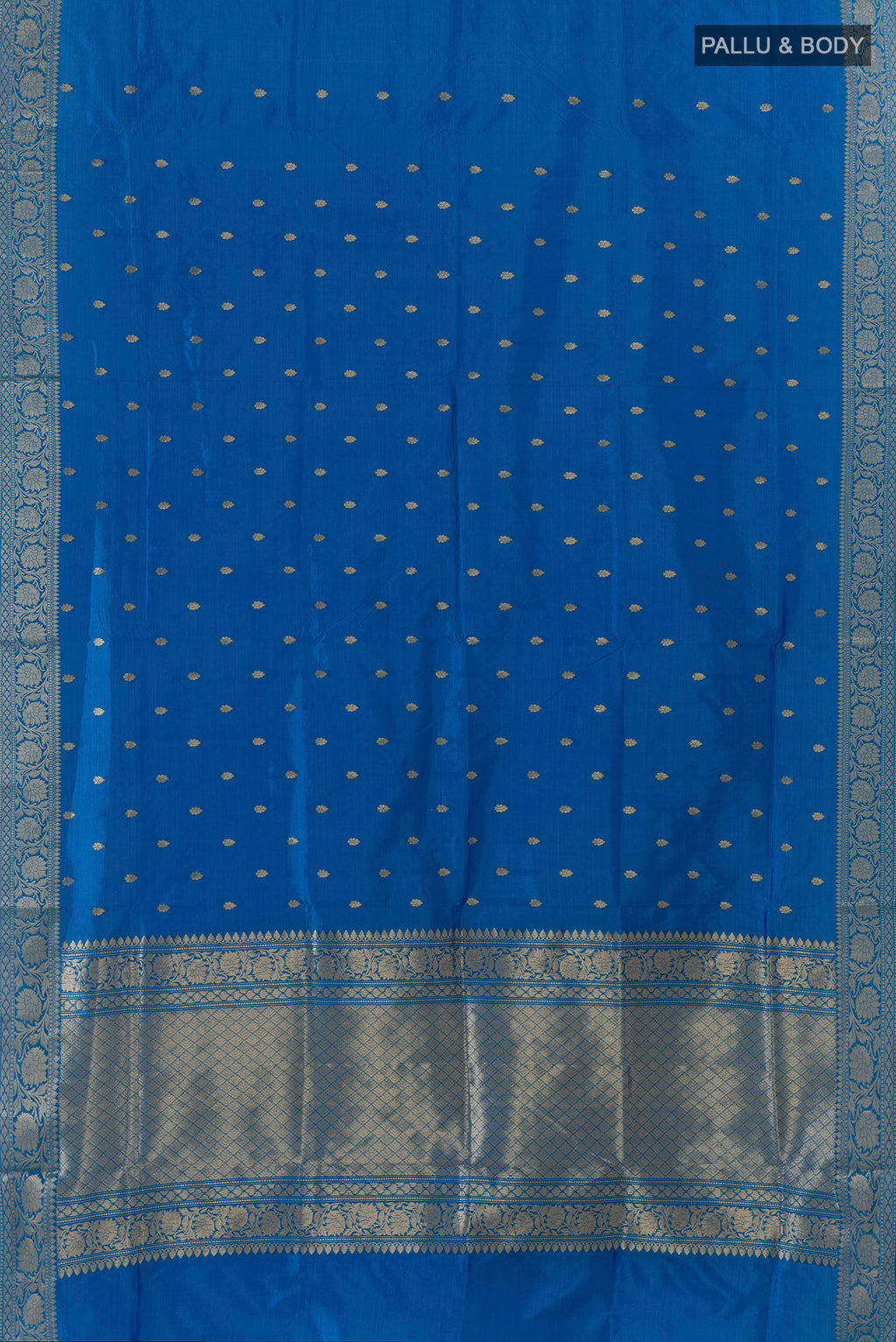 Flat view of Pure Silk Electric Blue Banarasi Katan Saree with Zari Butta on the body and Zari Border. 