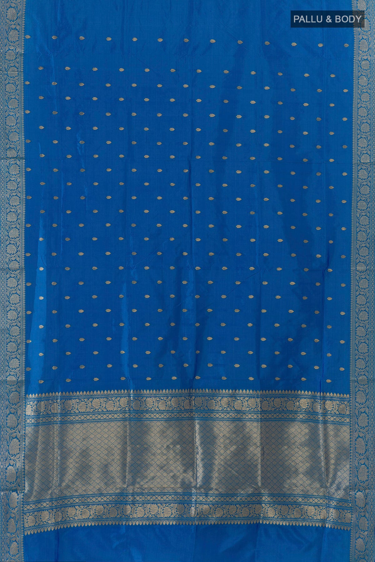 Flat view of Pure Silk Electric Blue Banarasi Katan Saree with Zari Butta on the body and Zari Border. 