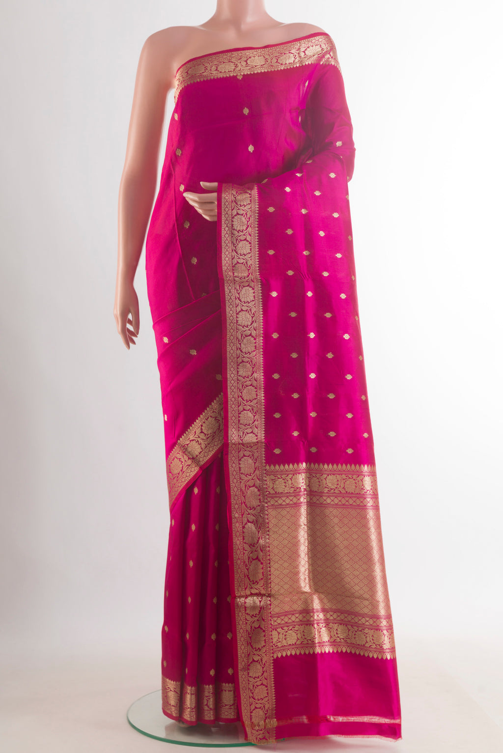 Pure Silk Pink Banarasi Katan Saree with Zari Butta on the body and Zari Border.  displayed on a mannequin