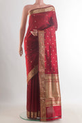 Pure Silk Maroon Banarasi Katan Saree with Zari Butta on the body and Zari Border.  displayed on a mannequin