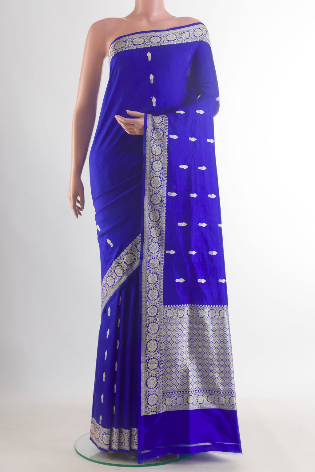 Pure Silk Royal Blue Banarasi Katan Saree with Thread Butta on the body and Thread Border.  displayed on a mannequin