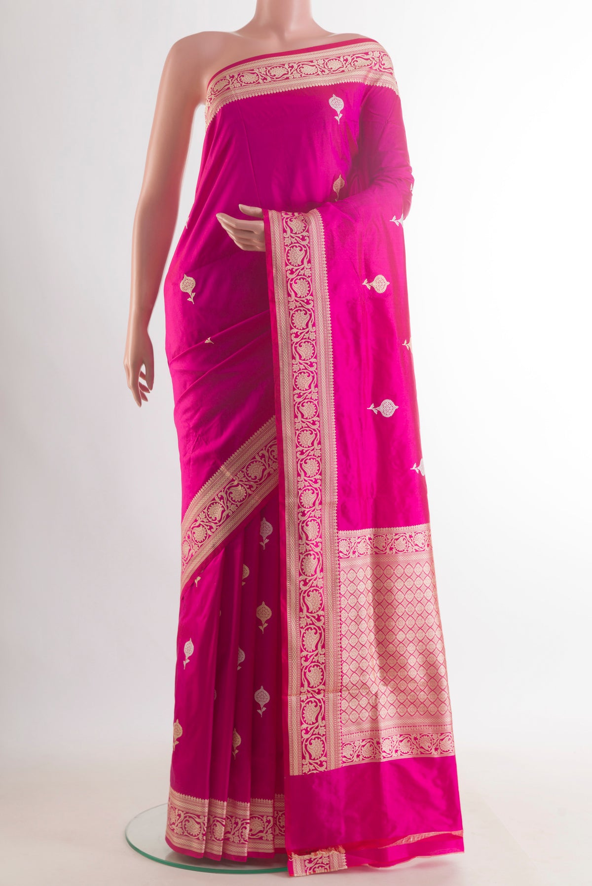 Pure Silk Pink Banarasi Katan Saree with Thread Butta on the body and Thread Border.  displayed on a mannequin