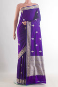 Pure Silk Violet Banarasi Katan Saree with Thread Butta on the body and Thread Border.  displayed on a mannequin