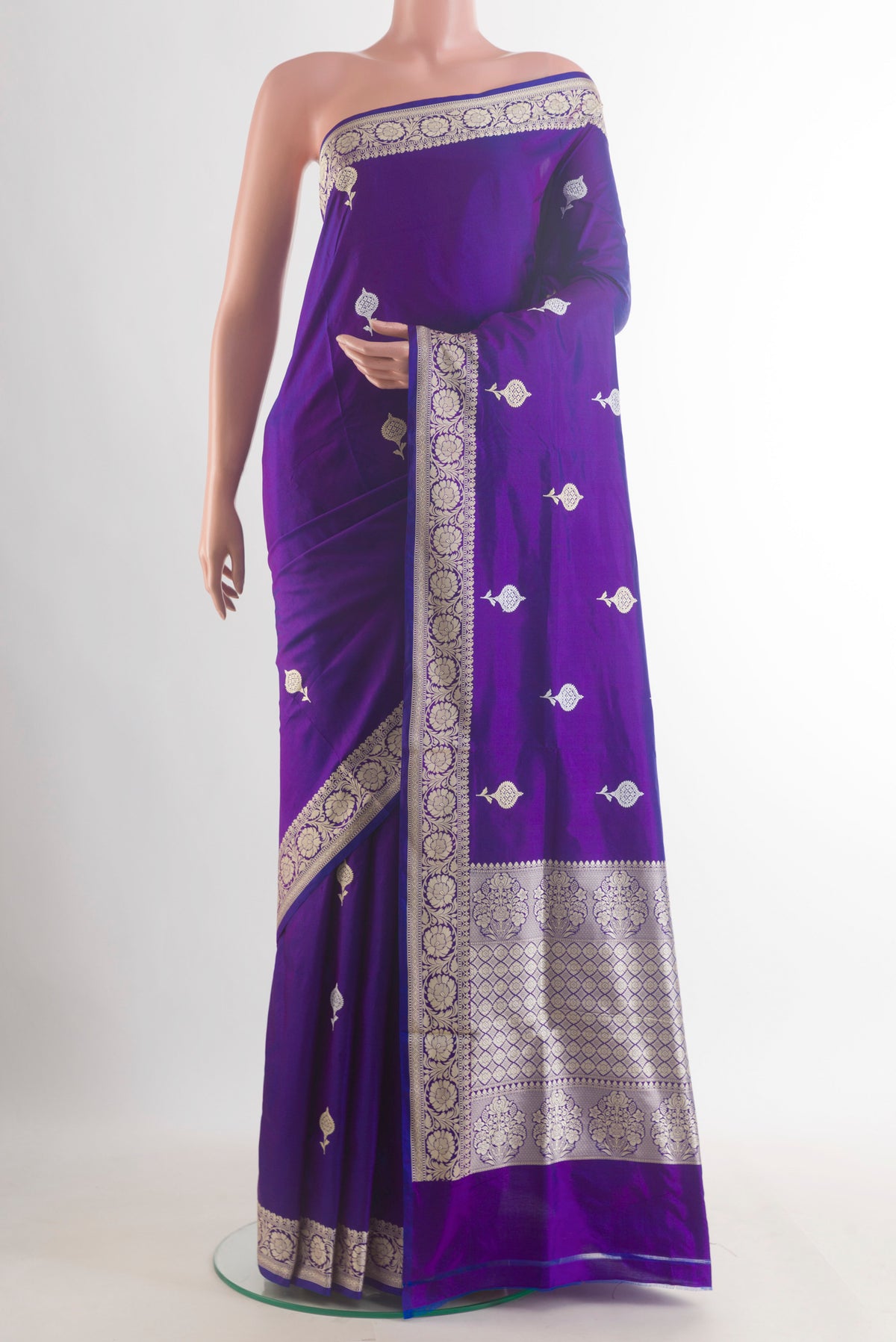 Pure Silk Violet Banarasi Katan Saree with Thread Butta on the body and Thread Border.  displayed on a mannequin