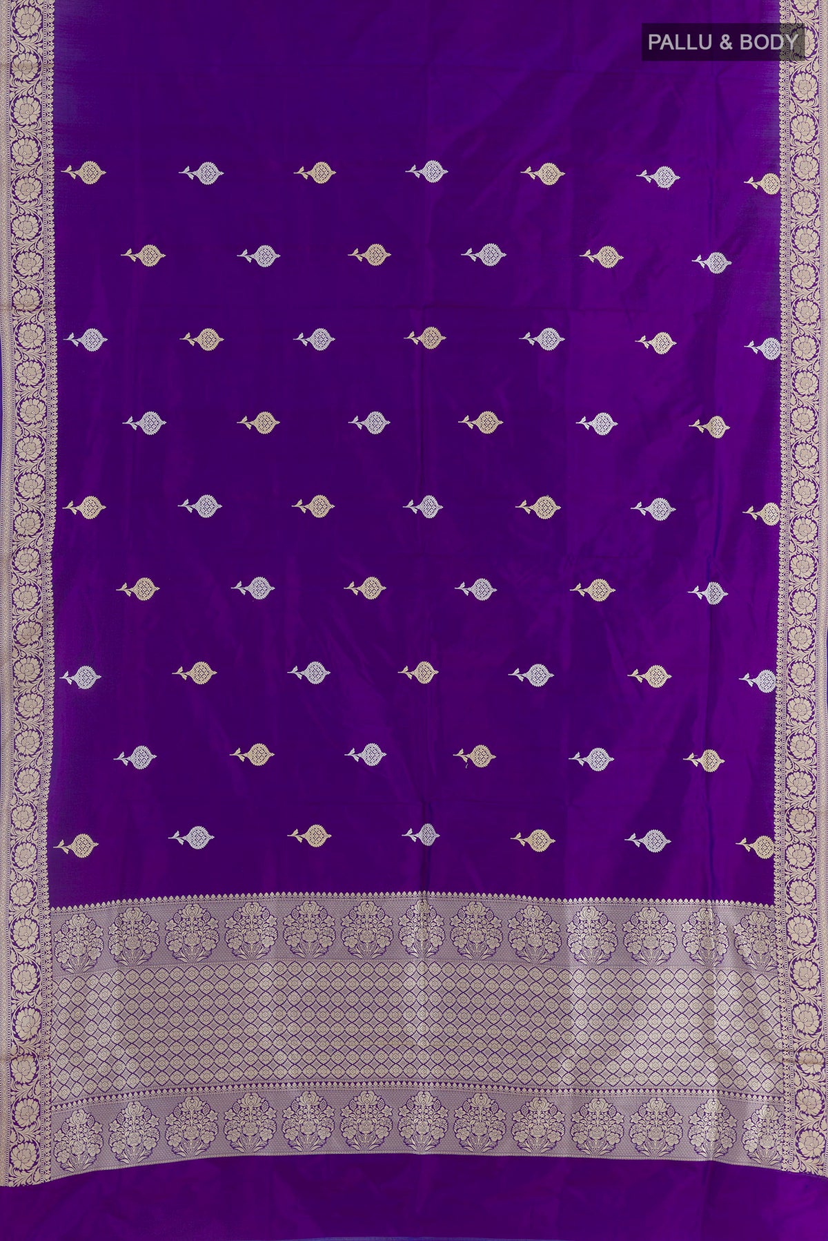 Flat view of Pure Silk Violet Banarasi Katan Saree with Thread Butta on the body and Thread Border. 