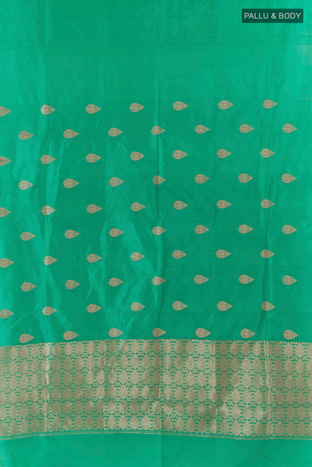 Flat view of Pure Silk Green Banarasi Katan Saree with Zari Butta on the body and Without Border. 